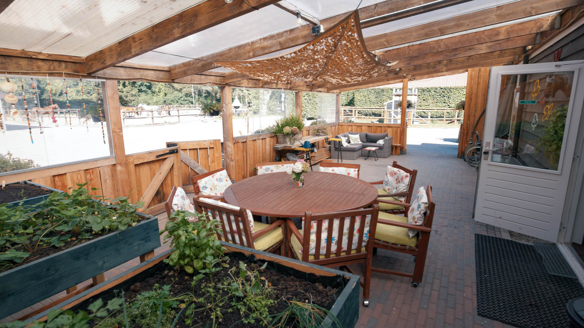 Het overdekte terras